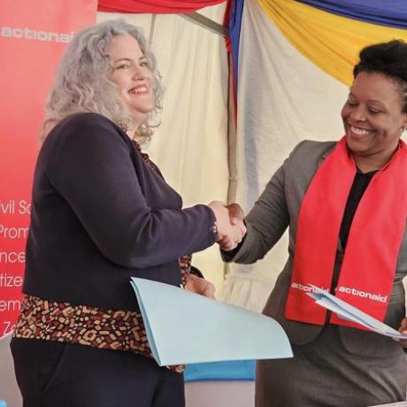 Swedish Embassy in Lusaka Acting Ambassador Sussana Hughes and ActionAid Country Director Faides TembaTemba During a grant signing ceremony in Lusaka 